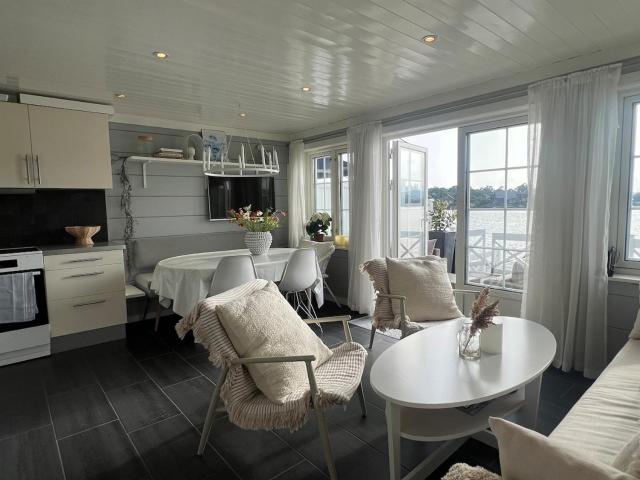 Idyllic cabin on the waterfront with boat rental