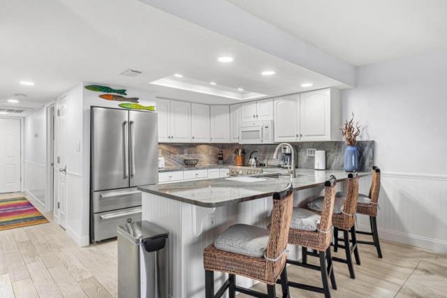 Escape to Beach Oasis! Family Friendly, Updated Beachside Condo with Heated Pool!