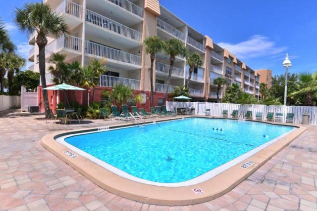 Escape to Beach Oasis! Family Friendly, Updated Beachside Condo with Heated Pool!