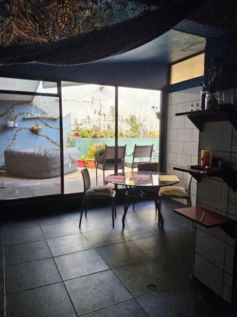 Apartamento vista al jardín, cocina externa