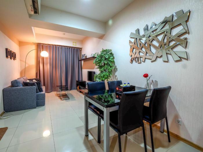 1BR Apartment at Casa Grande Residence near Kota Kasablanka By Travelio