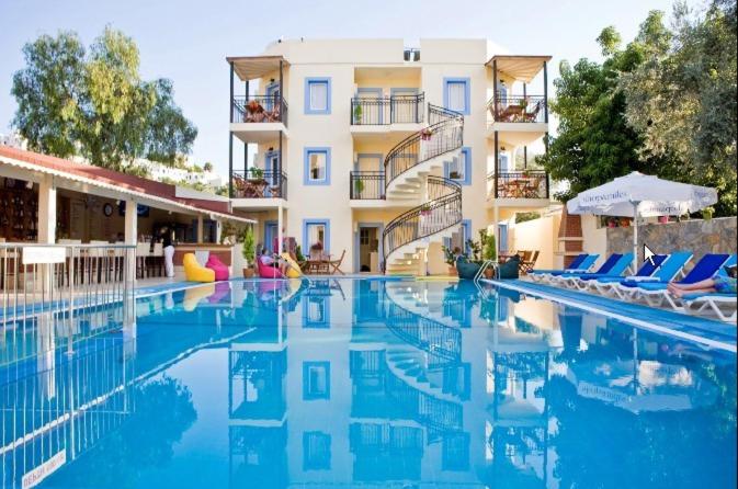 Merve Apartments, your home from home in central BODRUM, street cats frequent the property, notapartments have balconies , ground floor have terrace with table and chairs