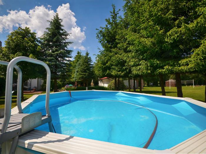 Pleasing Holiday Home with Swimming Pool BBQ Pond Garden