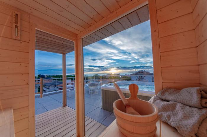 Aurea Attico con Jacuzzi e vista mare Lignano