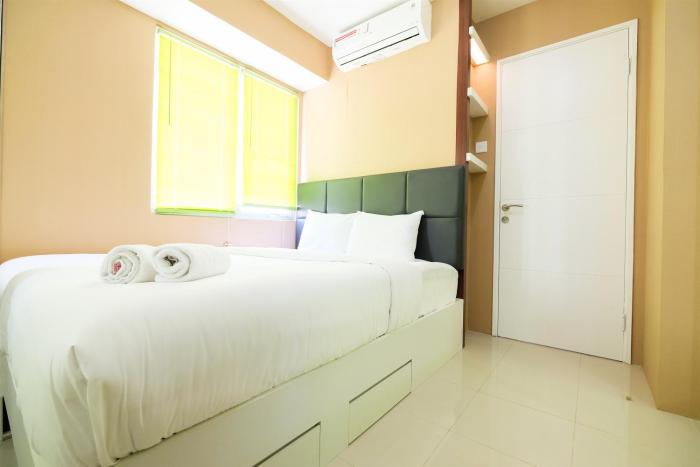 Luxurious 2BR Bassura City Apartment with Mall Access By Travelio