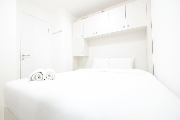 2BR Bassura City Apartment with City View By Travelio