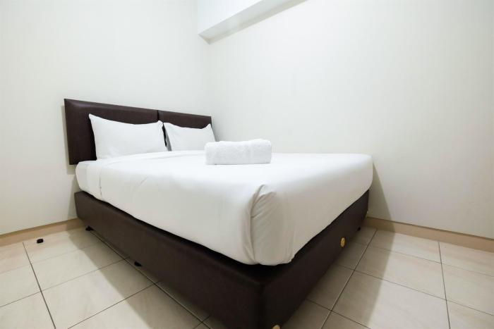 2BR with Sofa Bed The Springlake Summarecon Bekasi Apartment By Travelio