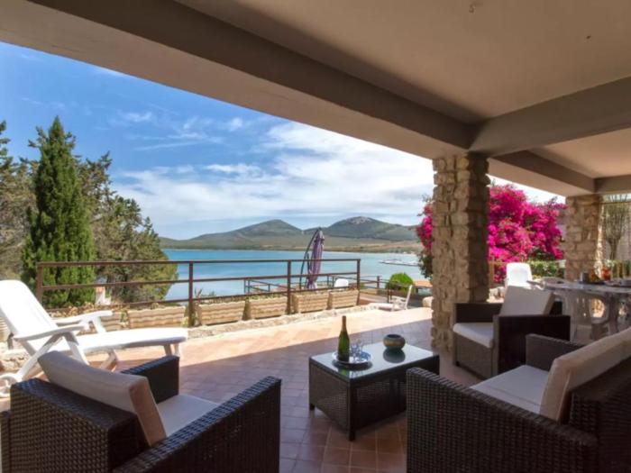ClickSardegna Villa Flavia with seafront terrace in the Porto Conte Nature Park
