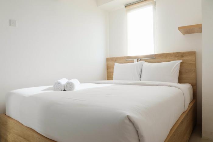 Spacious and Clean 3BR Bassura City Apartment By Travelio