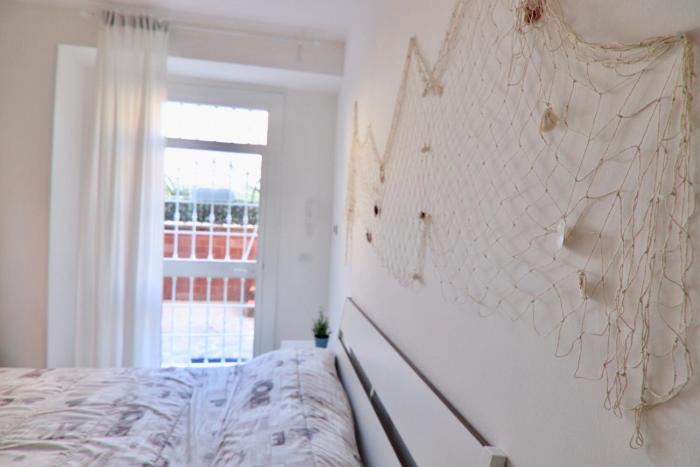 Holidayhouse Ostia - Libeccio