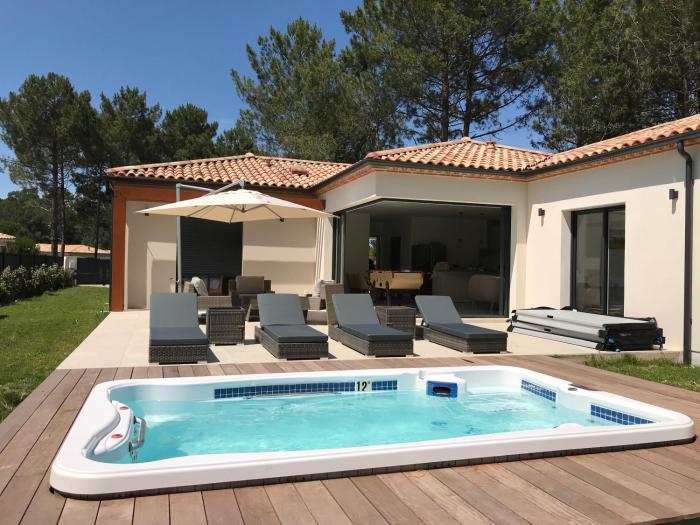 Location villa entre lac et océan avec son spa de nage