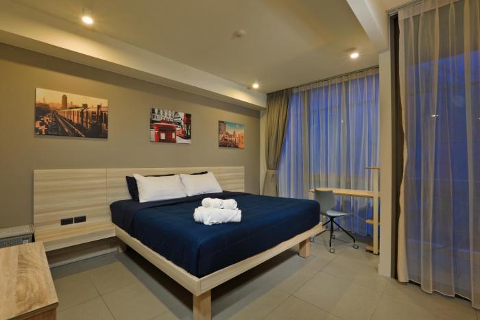 Oceanstone by Holy Cow, studio, next building view