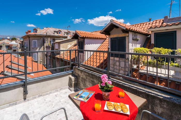 Rooftop city view apartment in the palace walls