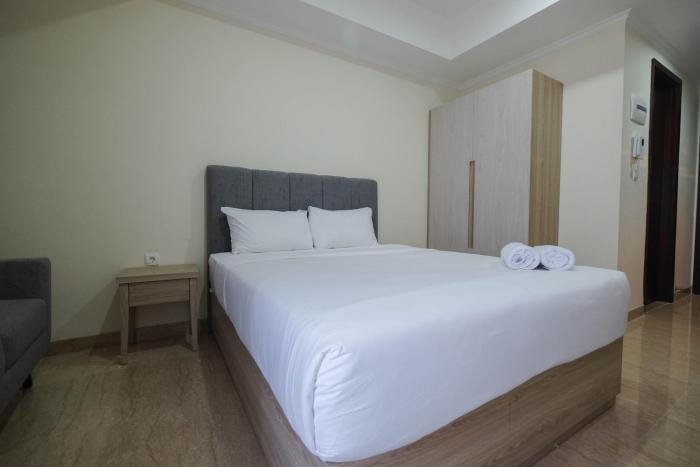 Simply Furnished Studio at Menteng Park Apartment By Travelio