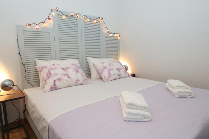 Your address in Koukaki by Athenian Homes