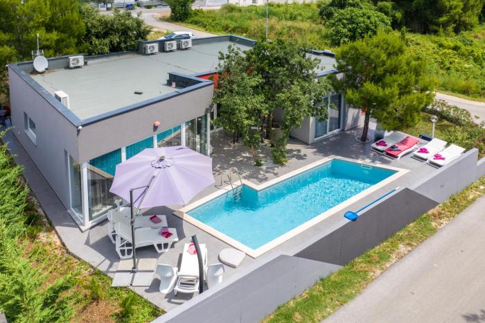 Modern villa Jura with pool near the beach, extra pool heating available