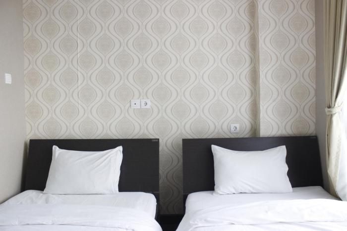 Stylish 1BR near ITB University at Dago Suites Apartment By Travelio