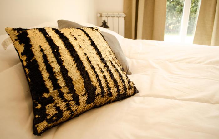 Aiksh Estudio H-3 Pax, parrilla y estacionamiento