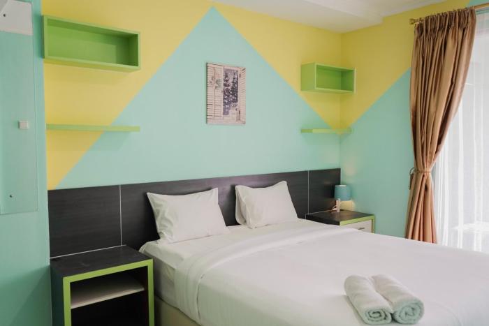 Elegant and Comfy 1BR Green Central City Glodok Apartment By Travelio