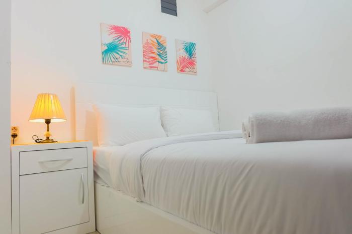 Pleasant 2BR Apartment at Bassura City near Shopping Mall By Travelio