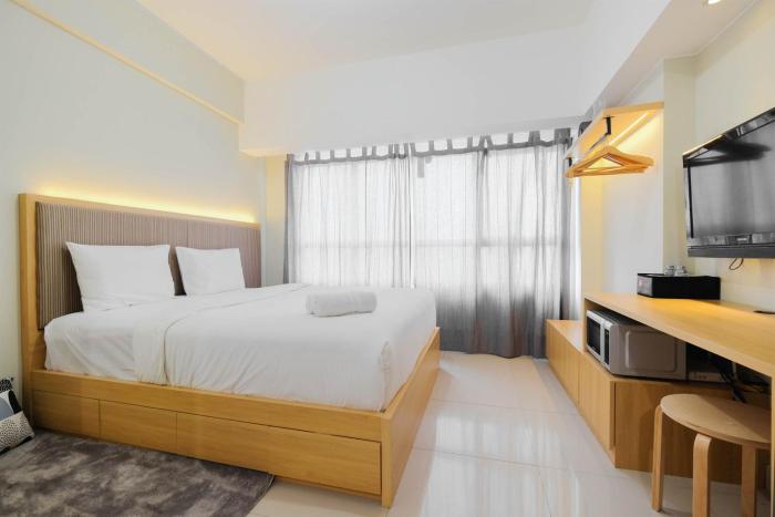 Modern Studio @ Springlake Summarecon Apartment By Travelio