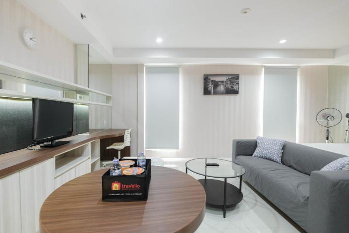 Elegant and Comfy Studio Azalea Suites Apartment Cikarang By Travelio