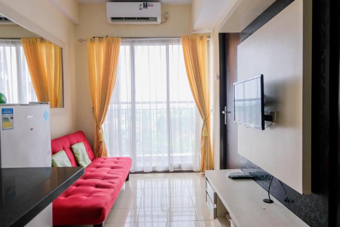 Homey 2BR at Serpong Greenview Apartment By Travelio