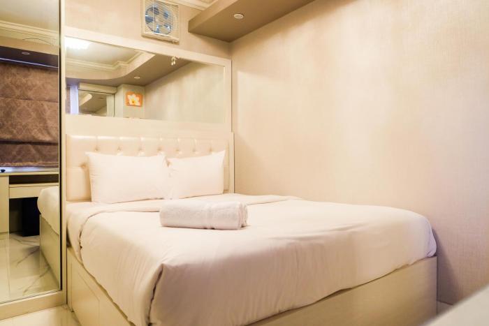 Posh 2BR Apartment at Bassura City near Shopping Mall By Travelio