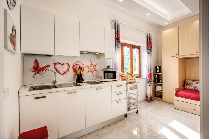 Casa Lolla, red rose in the heart of Sorrento