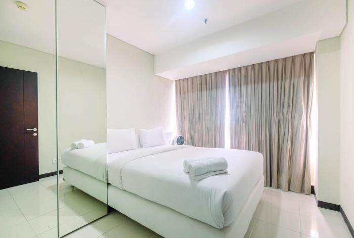 Spacious and Comfy 2BR Nifarro Park Apartment By Travelio