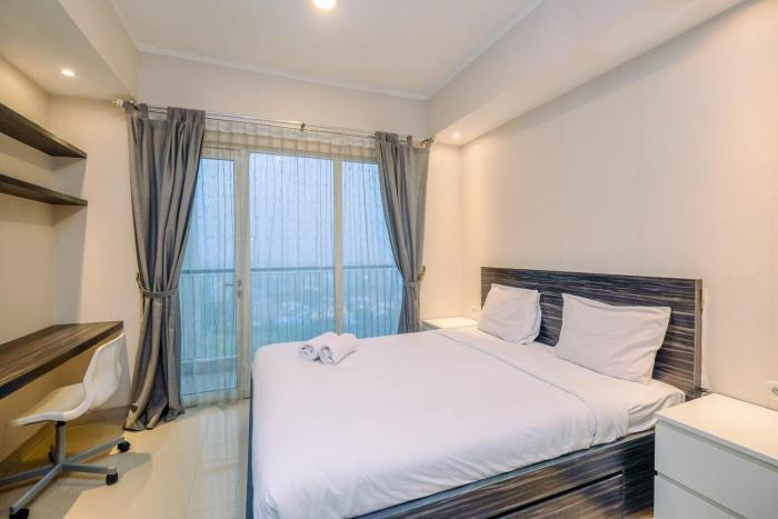 Warm and Cozy Studio at The Oasis Cikarang Apartment By Travelio