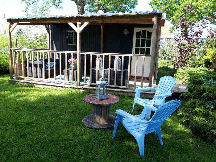 Tinyhouse NATUURHUISJE met veranda Bij de Molen tussen Alkmaar en Hoorn