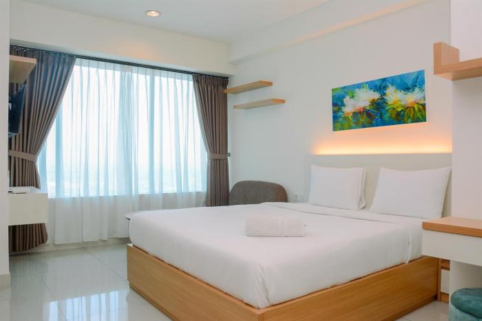 Simple Studio Apartment at Grand Kamala Lagoon By Travelio