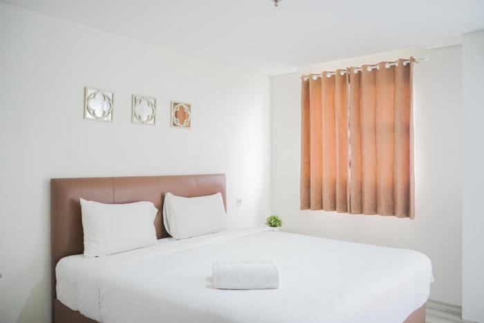 Minimalist Studio Bintaro Icon Apartment near British School By Travelio
