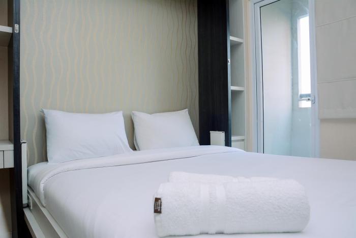 Comfy Studio Green Pramuka City Apartment with City View By Travelio