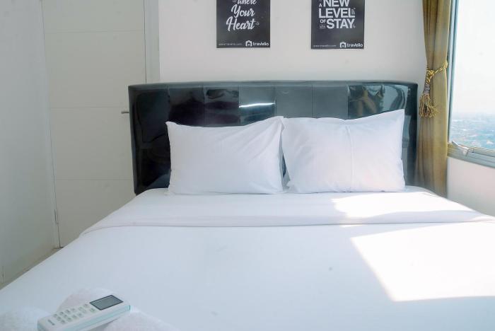 2BR Fully Furnished Minimalist Bassura City Apartment By Travelio