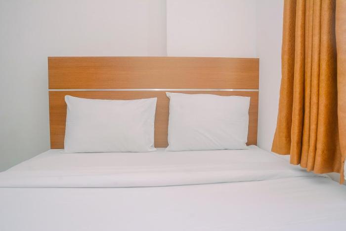 Comfortable and Fully Furnished 2BR Bassura City Apartment By Travelio