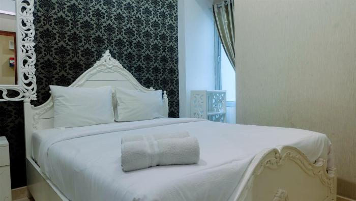 Pool View 2BR Apartment at Capitol Park Residence By Travelio