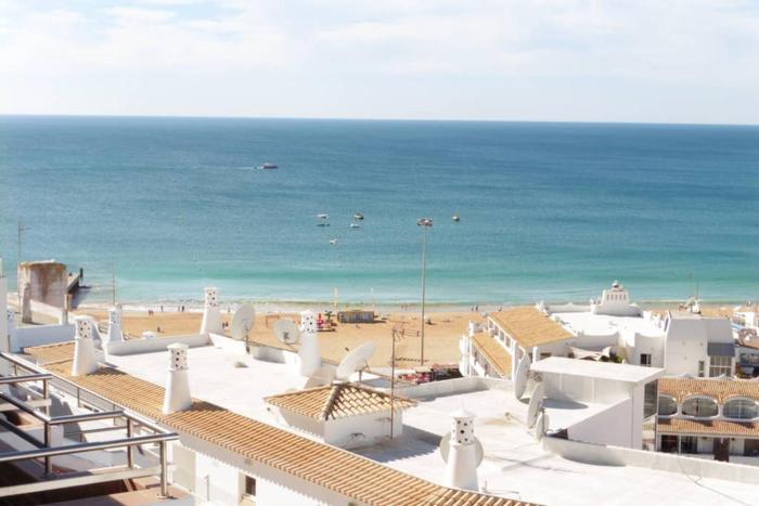 Close to the beach and in front of a stunning swimming pool!