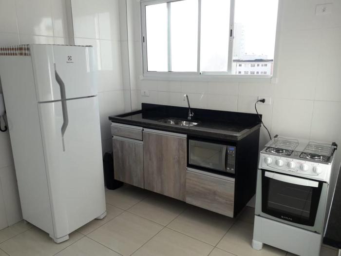 EXCELENTE APARTAMENTO NOVO - PRÓXIMO a PRAIA COM INTERNET !!