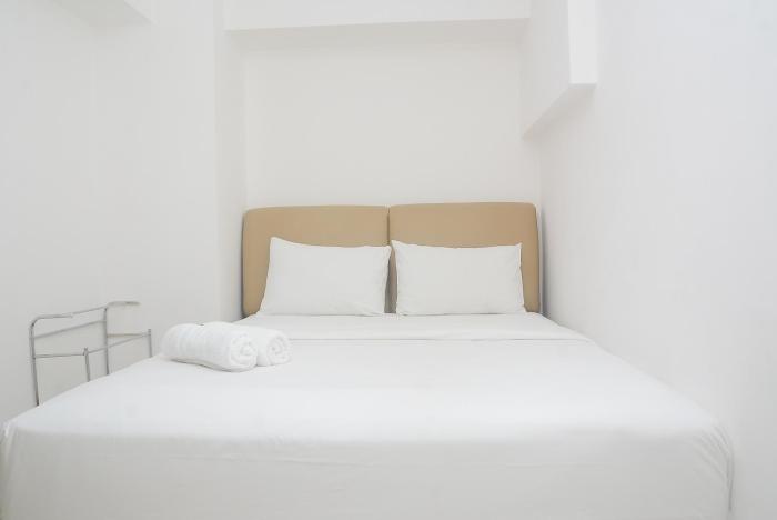 Minimalist and Stylish 1BR Bassura City Apartment By Travelio