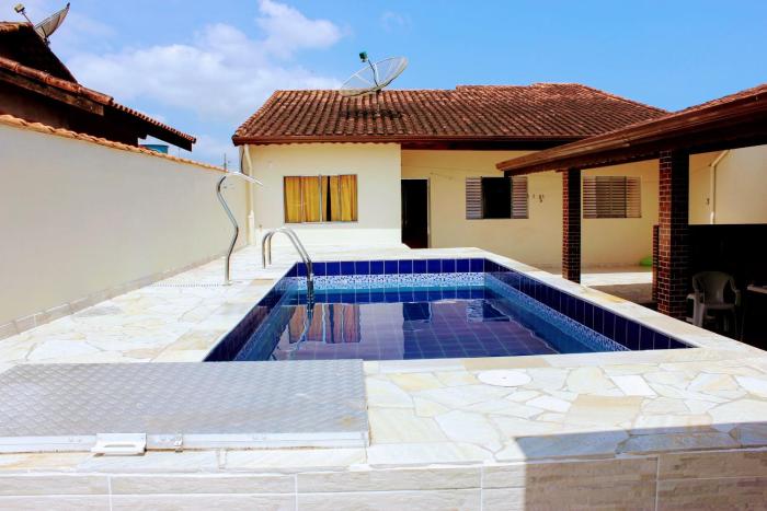Casa com piscina no litoral norte
