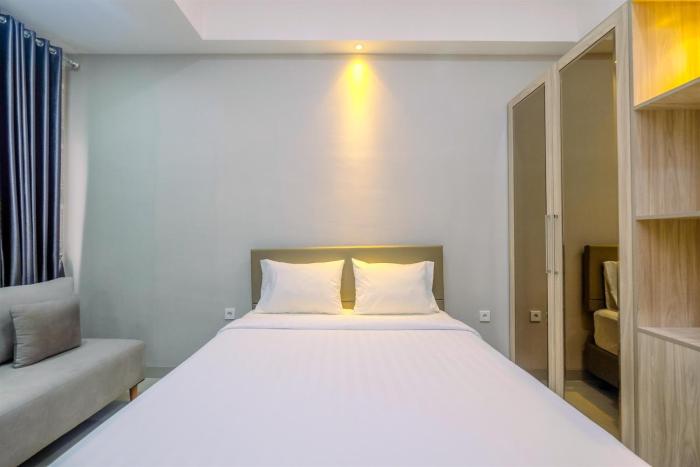 Homey and Warm Studio Apartment Oasis Cikarang By Travelio