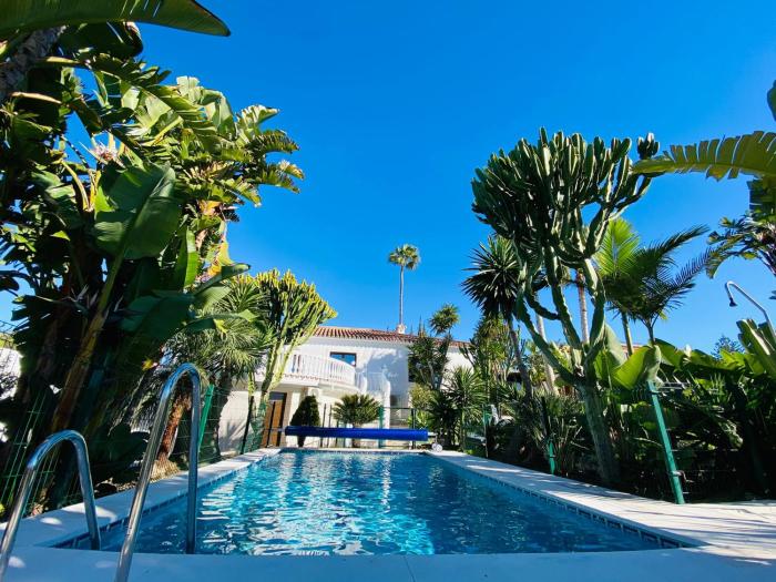 Apartments with tropical garden and sea water pool