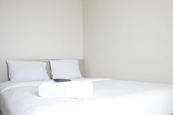 Best Location 2BR Tamansari La Grande Apartment By Travelio