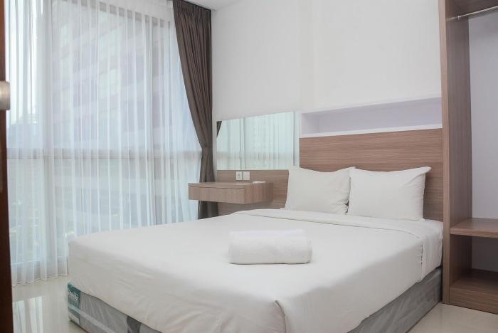 Modern 1BR at Ciputra World 2 Apartment By Travelio