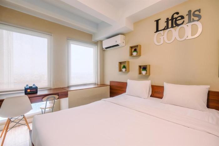 Modern and Compact Studio at Patraland Urbano Apartment By Travelio