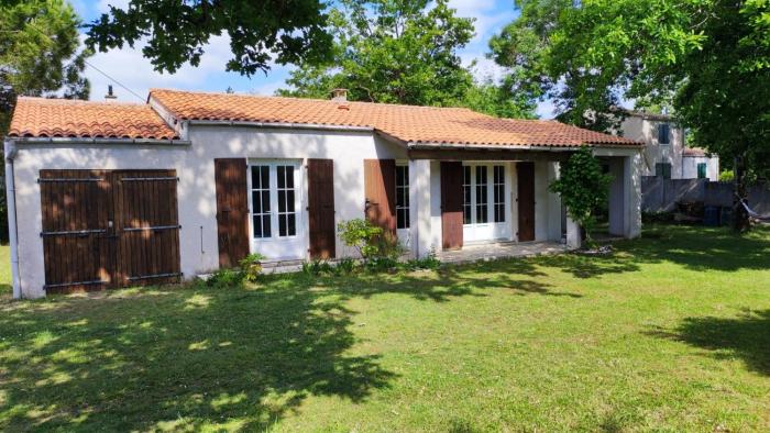 Maison à 8 min à pied de la Plage avec jardin clos et ombragé