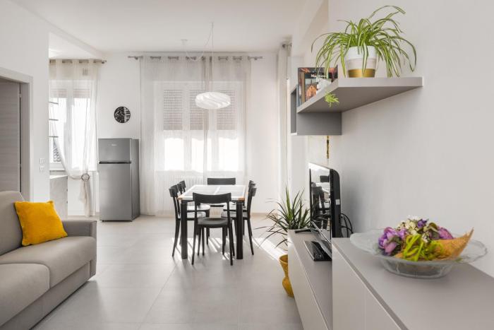 Civico40 Luminoso appartamento con balconi e garage privato