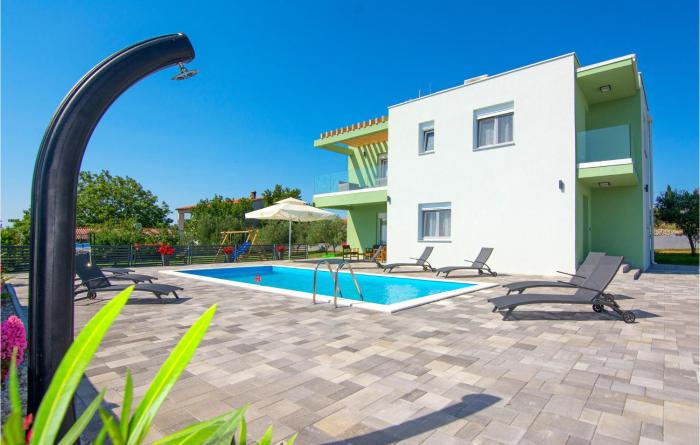 Beautiful Home In Vrsi With Wifi, Outdoor Swimming Pool And Heated Swimming Pool